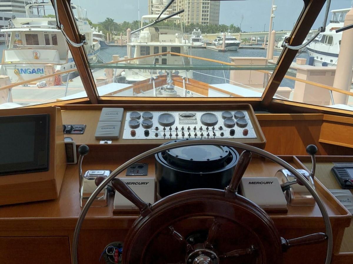 a radio on a table aboard DOVETAIL Yacht for Sale