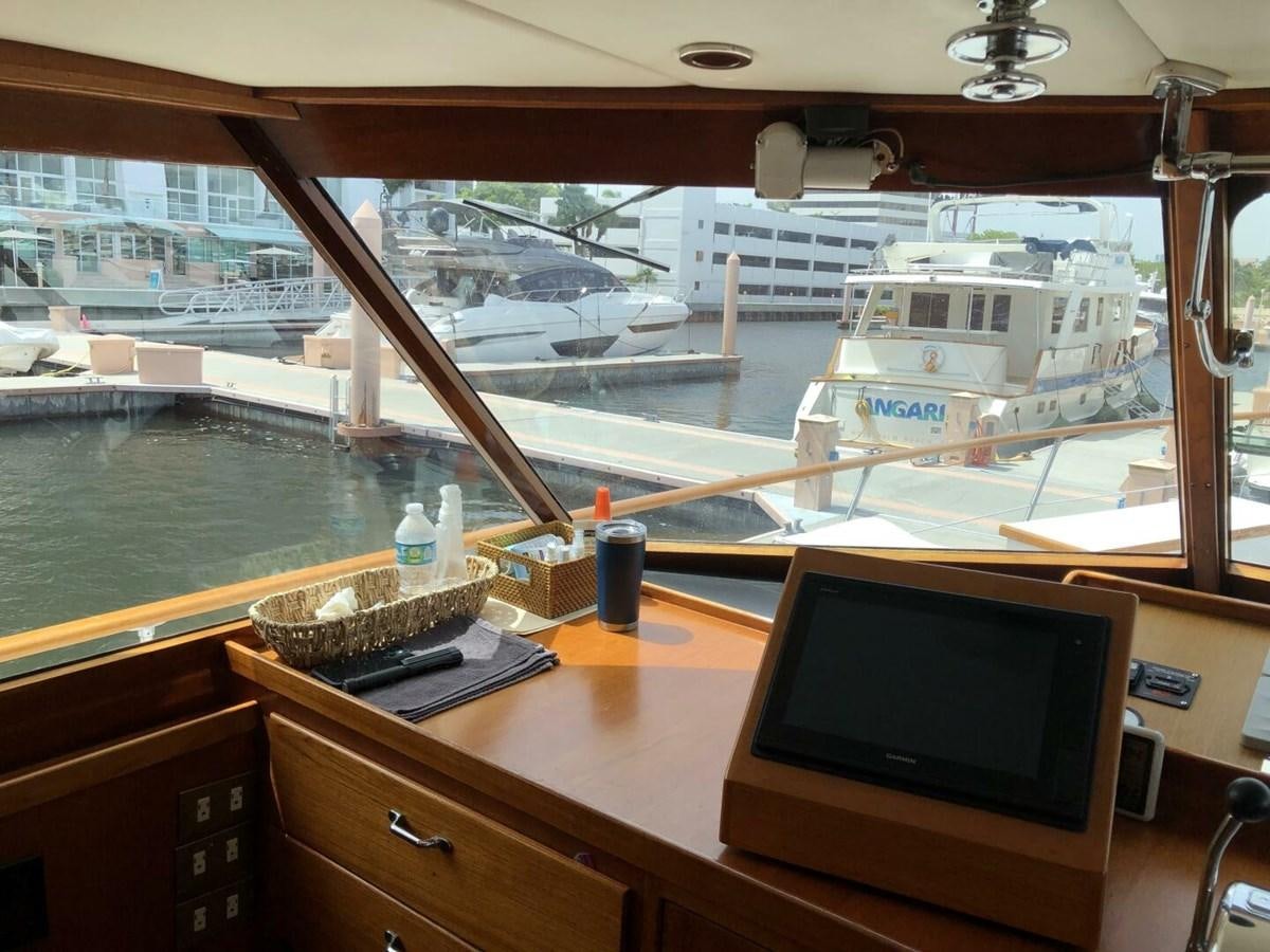 a computer on a desk aboard DOVETAIL Yacht for Sale