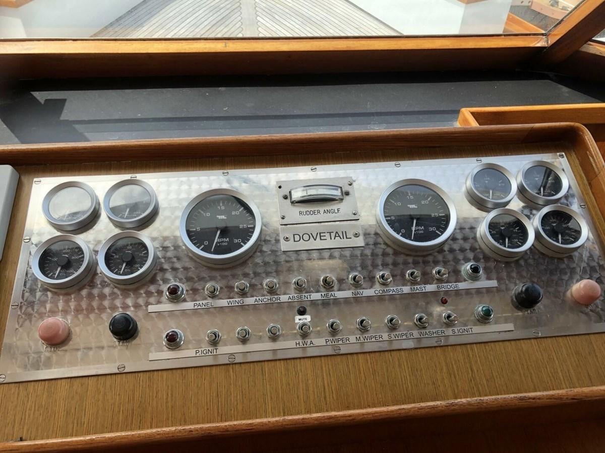 a wooden box with knobs aboard DOVETAIL Yacht for Sale