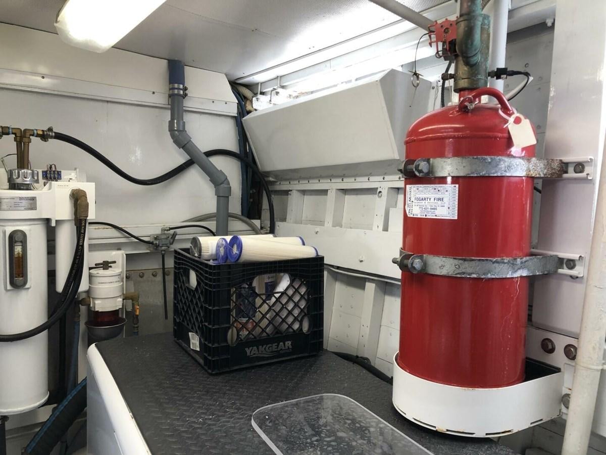 a machine in a room aboard DOVETAIL Yacht for Sale