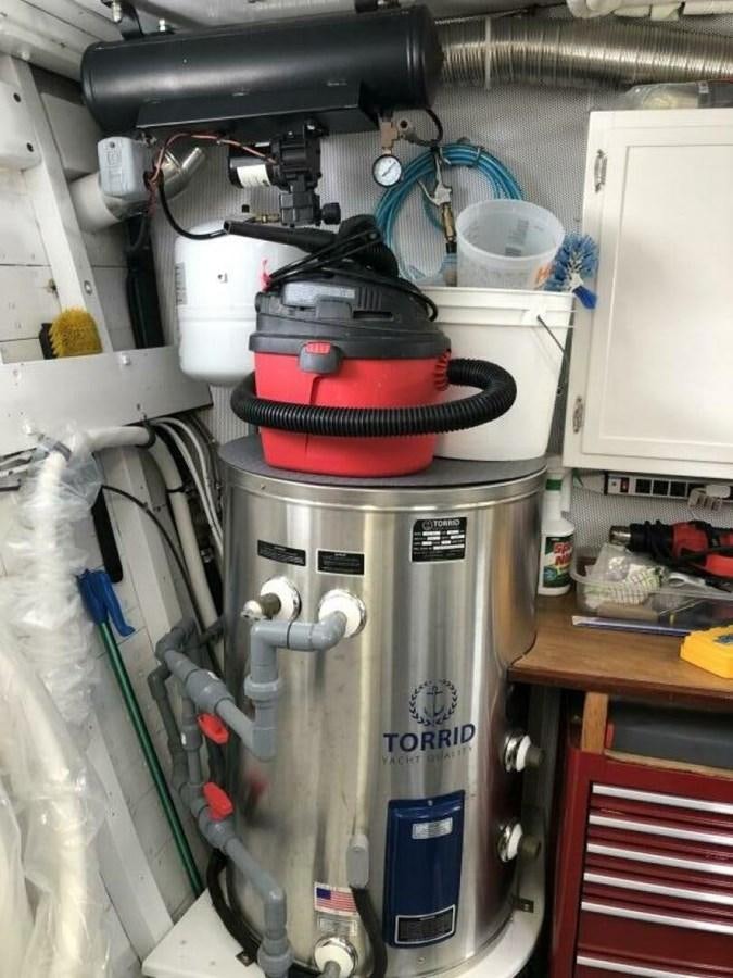 a machine with a red lid aboard DOVETAIL Yacht for Sale