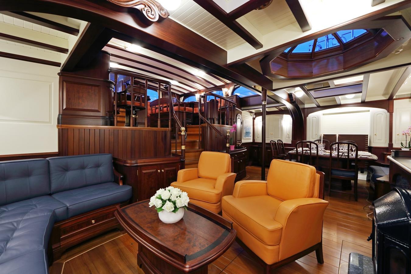 a room with couches and chairs aboard ASGARD Yacht for Sale