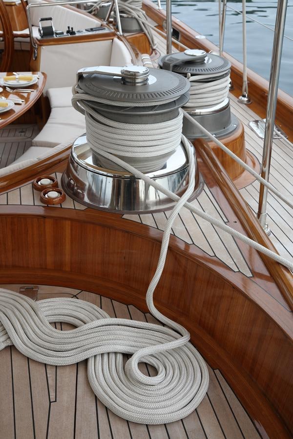 a stack of record player on a table aboard ASGARD Yacht for Sale
