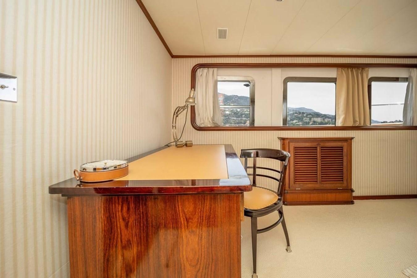 a table with a bowl on it aboard CLASSIC 40M BENETTI Yacht for Sale