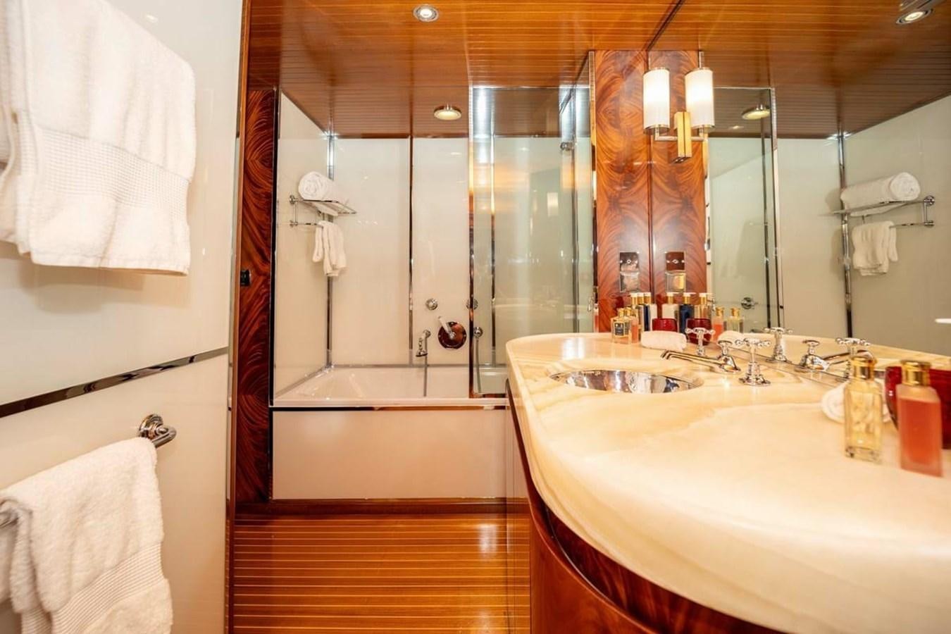 a bathroom with a sink and a shower aboard CLASSIC 40M BENETTI Yacht for Sale