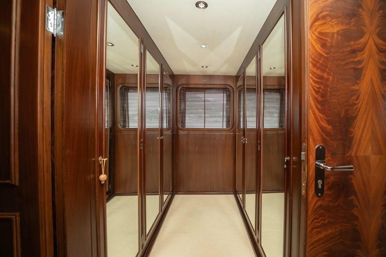 a hallway with doors aboard CLASSIC 40M BENETTI Yacht for Sale