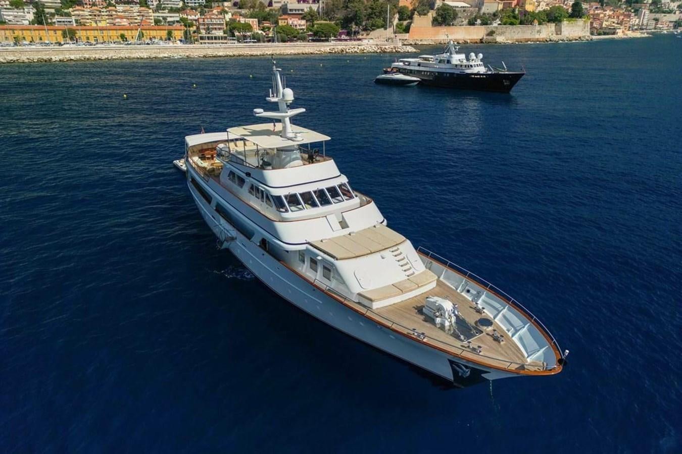 a couple of boats on the water aboard CLASSIC 40M BENETTI Yacht for Sale