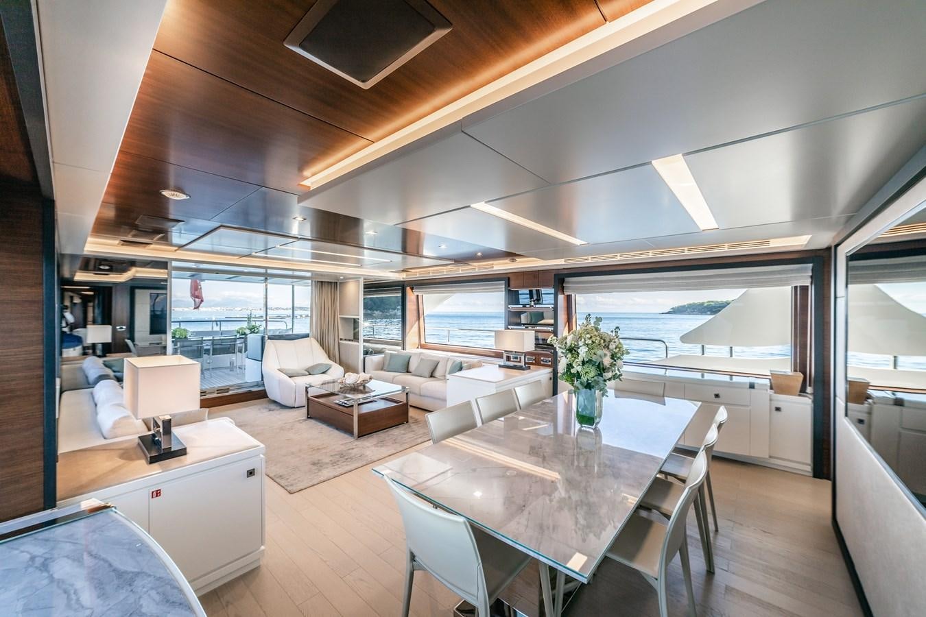 a living room with a large window aboard ADEL Yacht for Sale