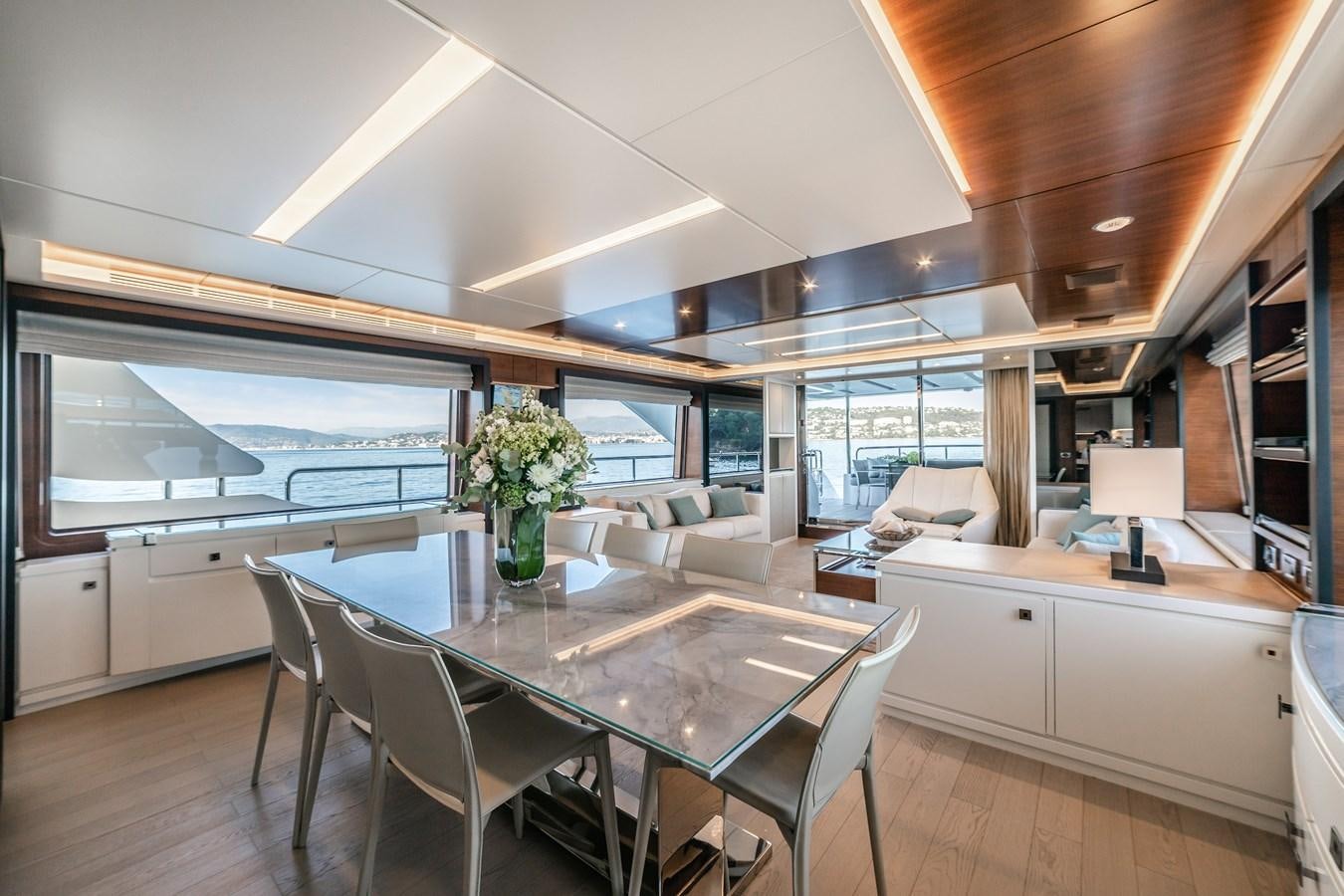 a large kitchen and dining area aboard ADEL Yacht for Sale