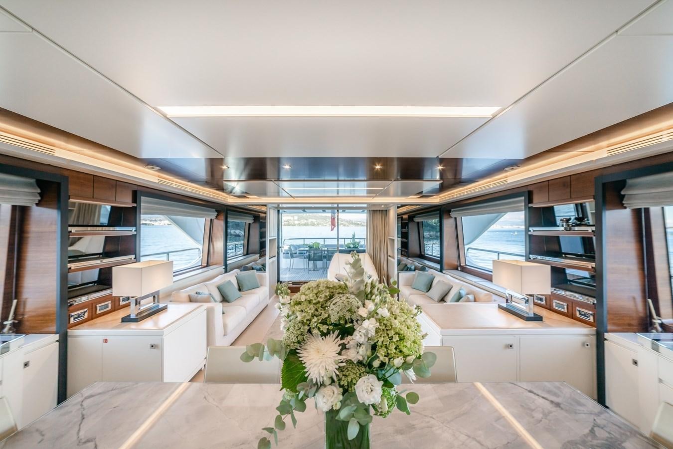 a room with a couch and a table aboard ADEL Yacht for Sale