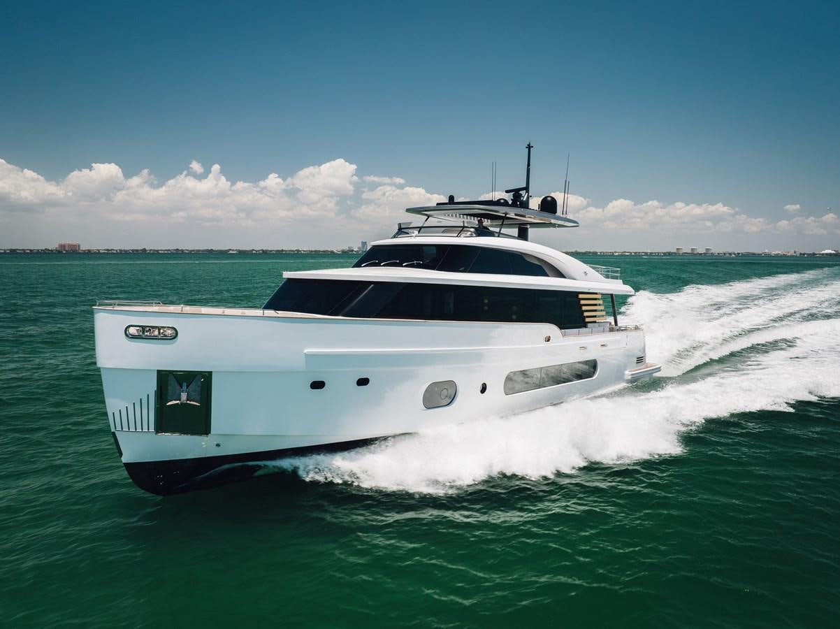 a white yacht on the water aboard EQUITES Yacht for Sale