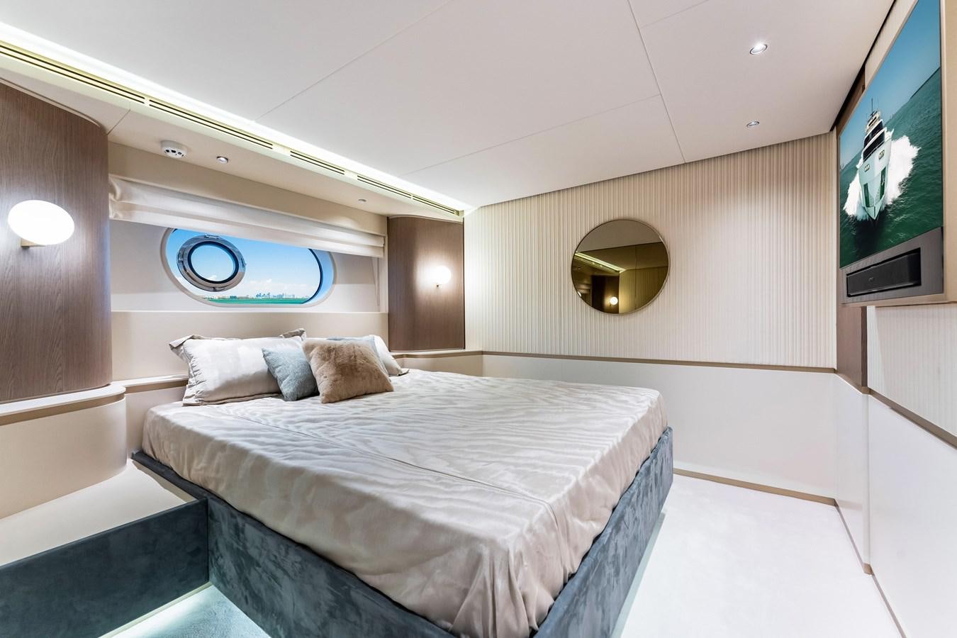 a bed in a room aboard EQUITES Yacht for Sale