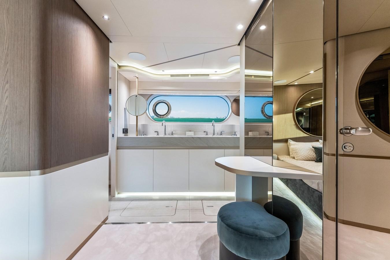 a room with a bed and a desk aboard EQUITES Yacht for Sale