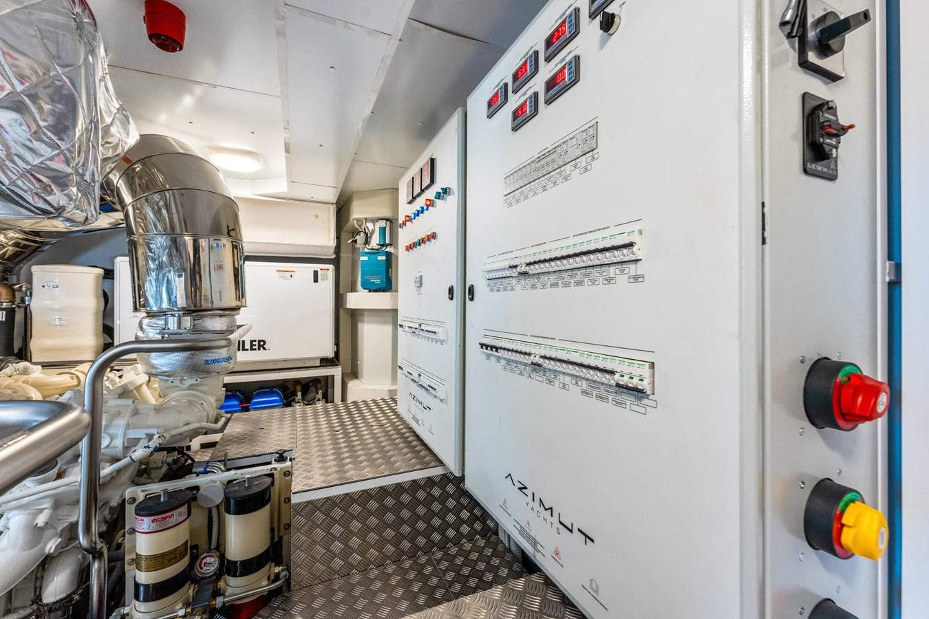 a large white machine aboard EQUITES Yacht for Sale