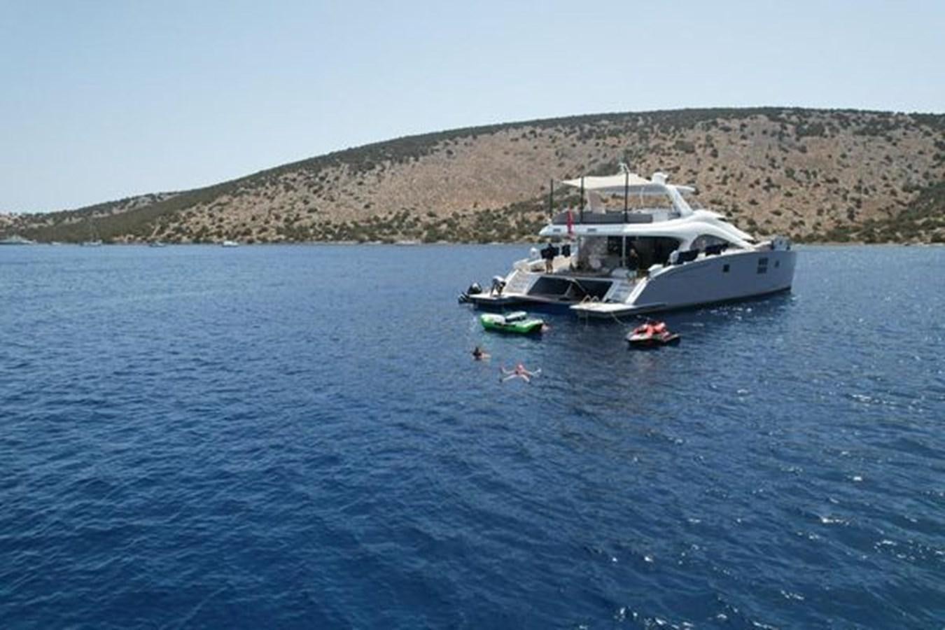 a boat in the water aboard 2015 SUNREEF 70 Yacht for Sale