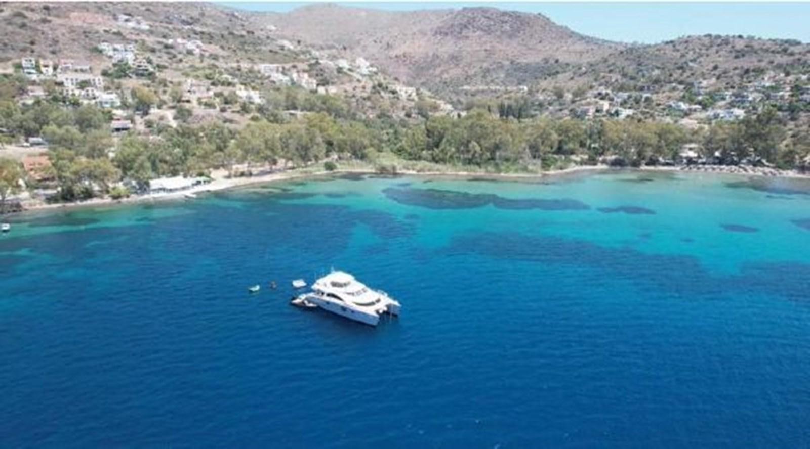 a boat on the water aboard 2015 SUNREEF 70 Yacht for Sale