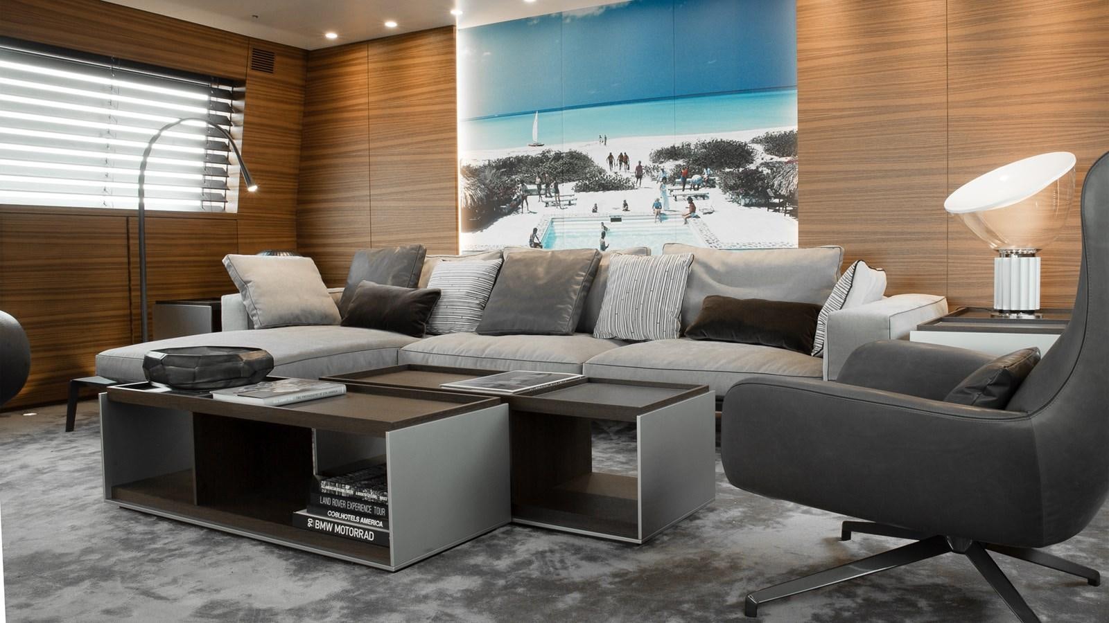 a living room with a couch and a tv aboard SILVER EDGE Yacht for Sale