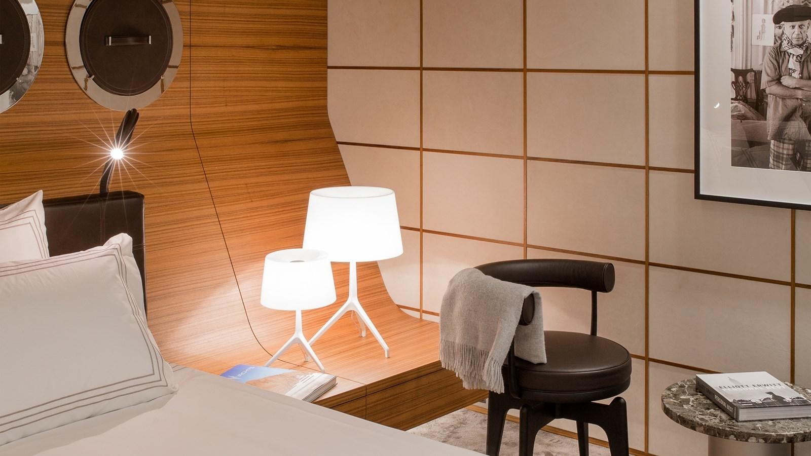 a room with a table and chairs aboard SILVER EDGE Yacht for Sale