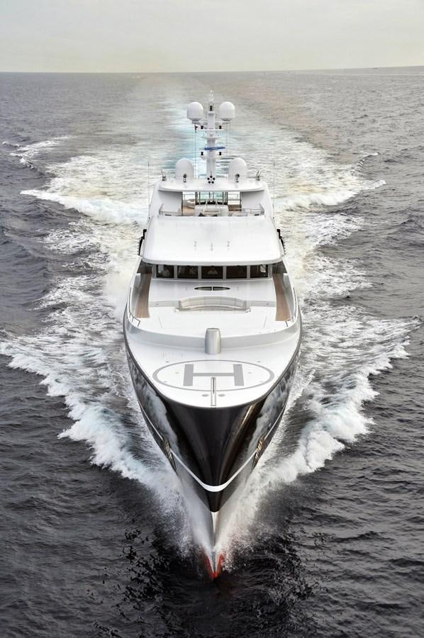 a large white ship in the water aboard PREDATOR Yacht for Sale