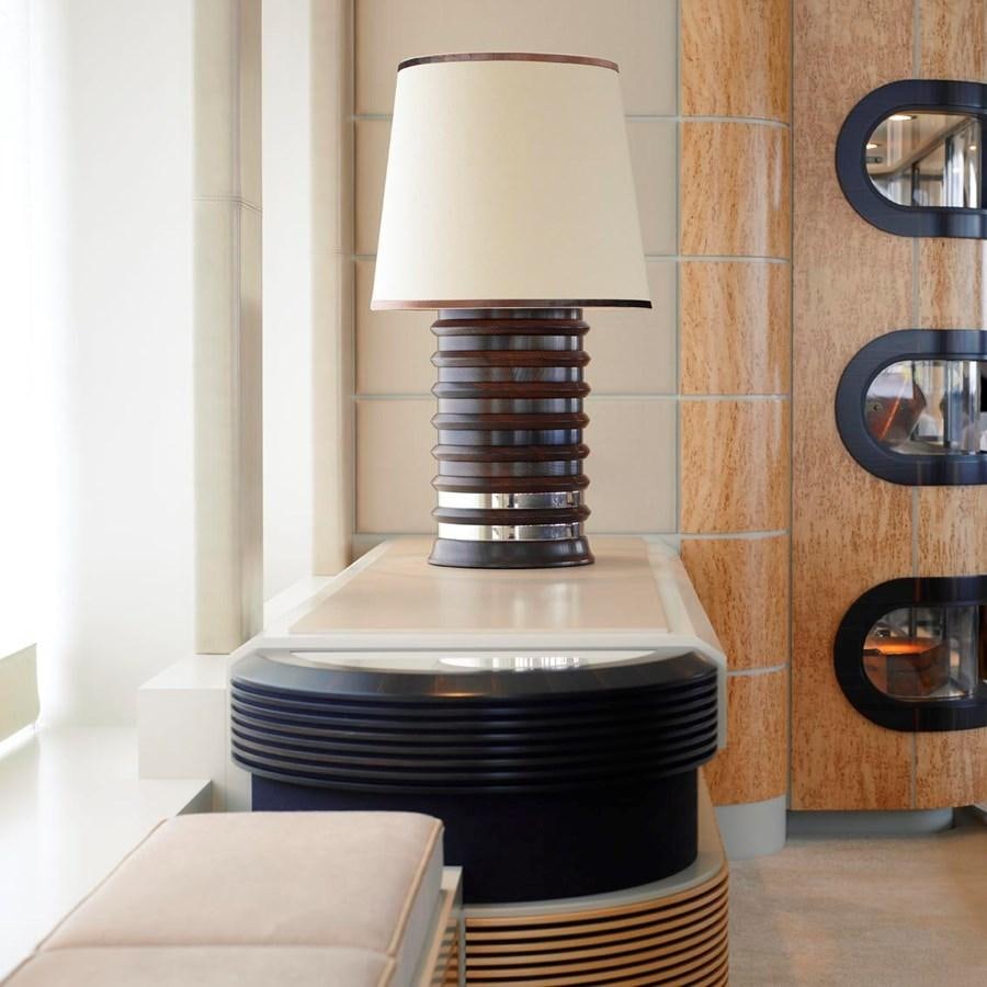 a stack of books aboard PREDATOR Yacht for Sale