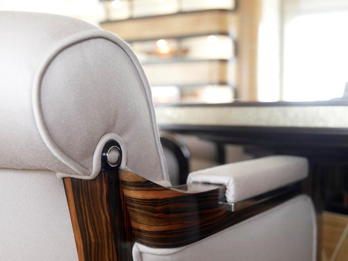 a book on a chair aboard PREDATOR Yacht for Sale