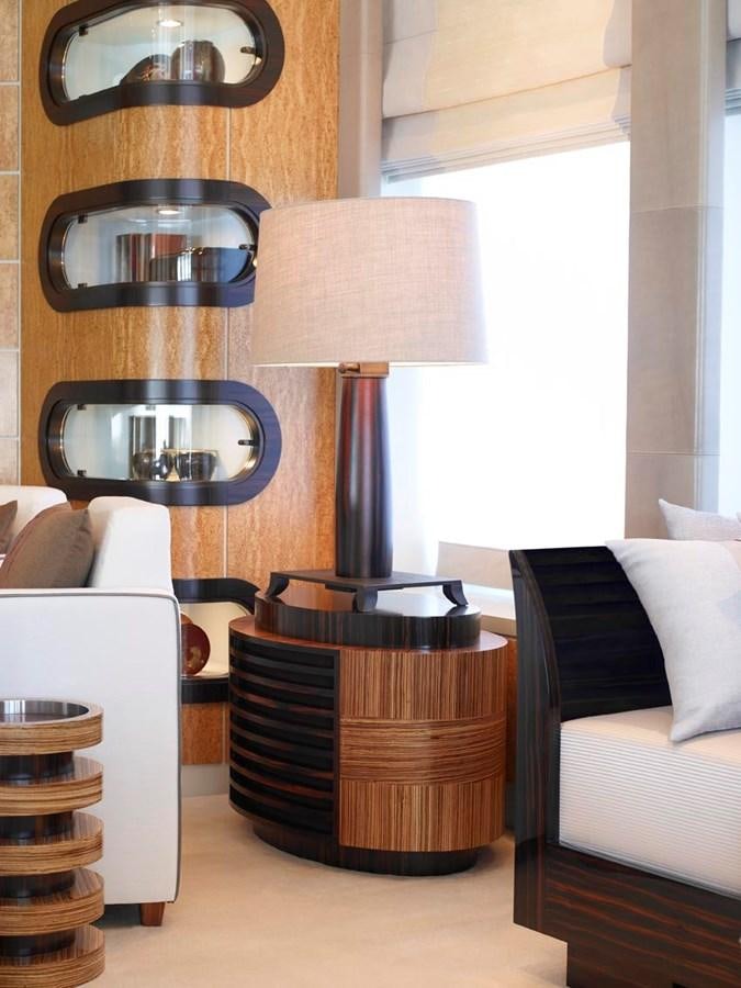 a room with a bed and a mirror aboard PREDATOR Yacht for Sale