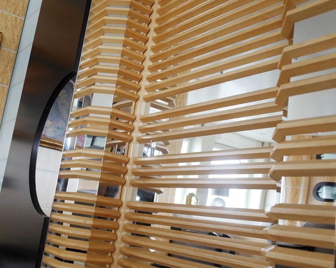 a view looking up at a tall building through a window aboard PREDATOR Yacht for Sale