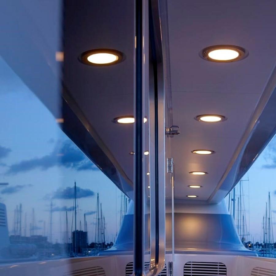 a view of a city through a window aboard PREDATOR Yacht for Sale