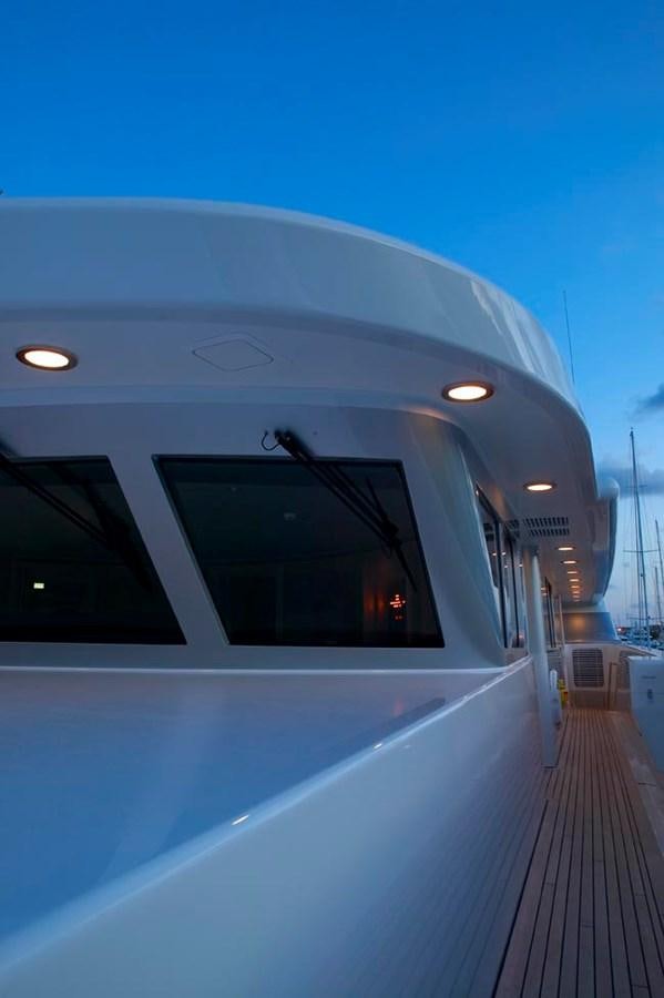a large white building with a large window aboard PREDATOR Yacht for Sale