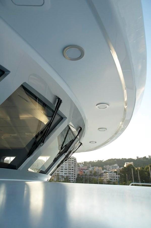 a view of a city from a window of a plane aboard PREDATOR Yacht for Sale