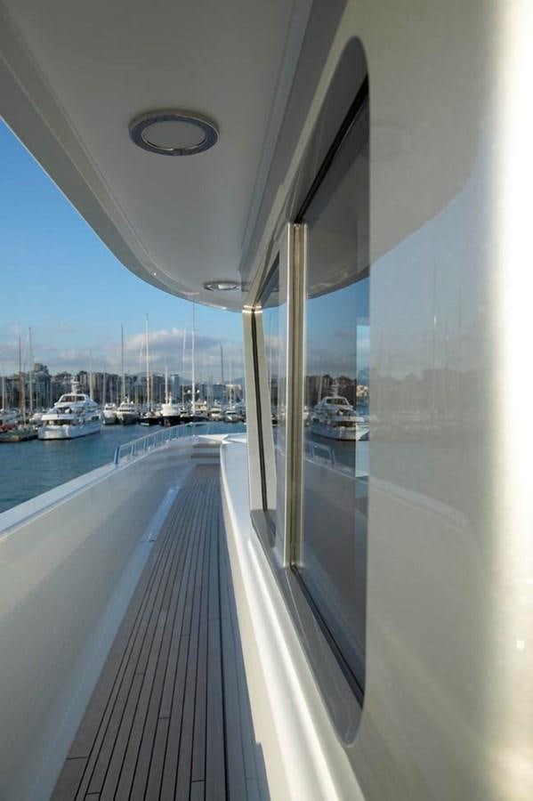 a view of a boat dock and boats on the water aboard PREDATOR Yacht for Sale