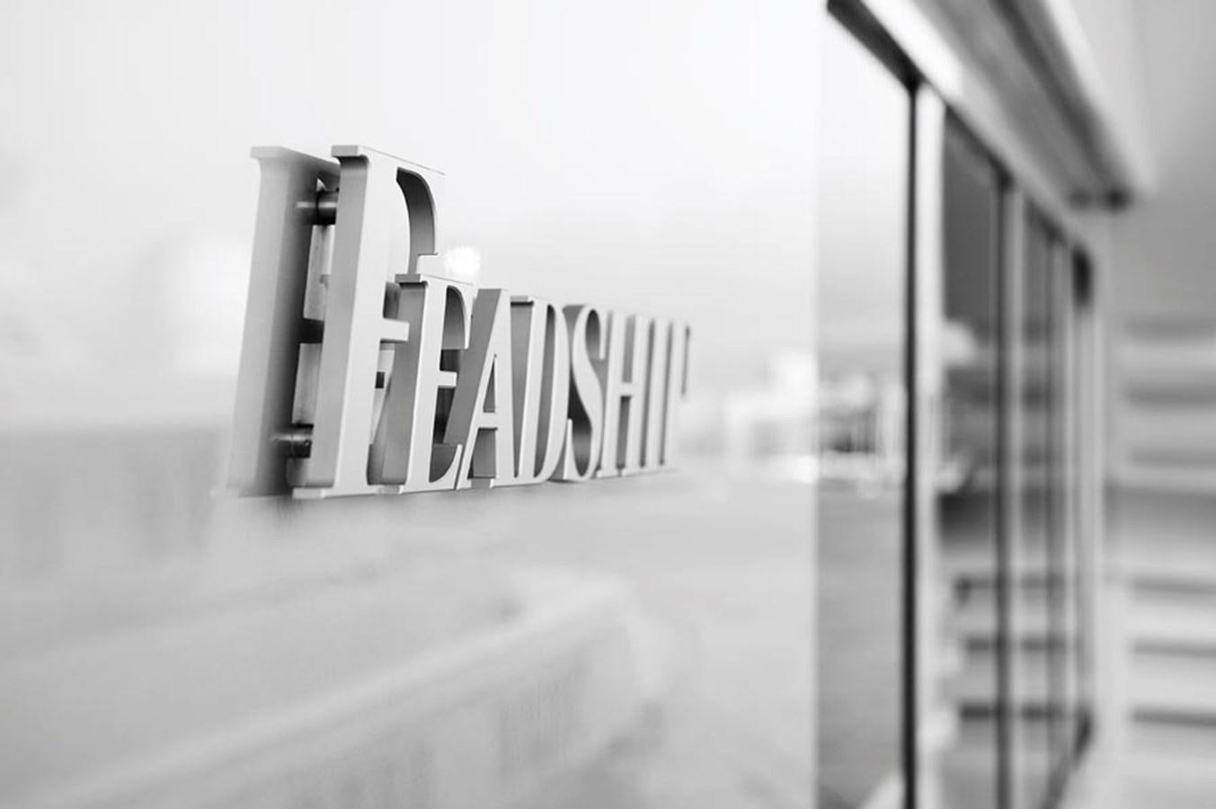 a sign on a glass wall aboard PREDATOR Yacht for Sale