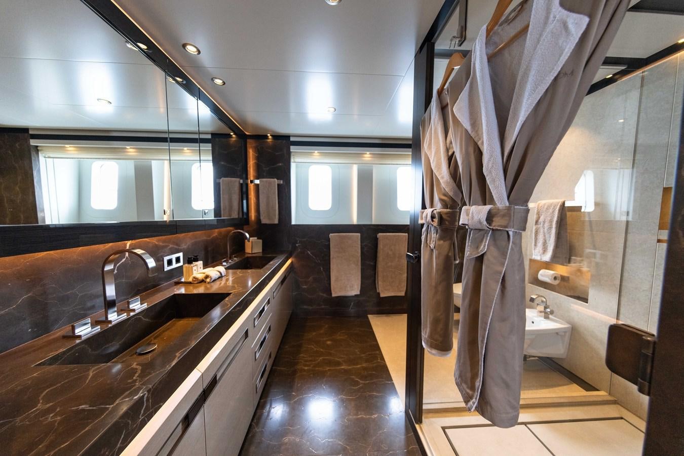 a bathroom with a large mirror aboard VAN TOM Yacht for Sale