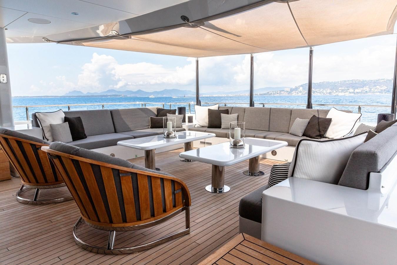 a living room with a large window aboard VAN TOM Yacht for Sale