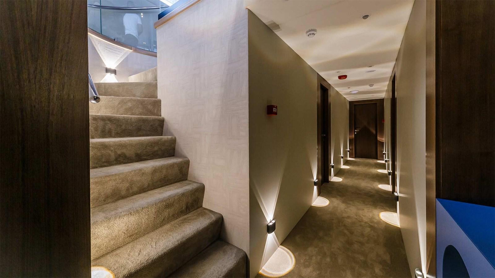 a staircase in a building aboard CLASE AZUL Yacht for Sale