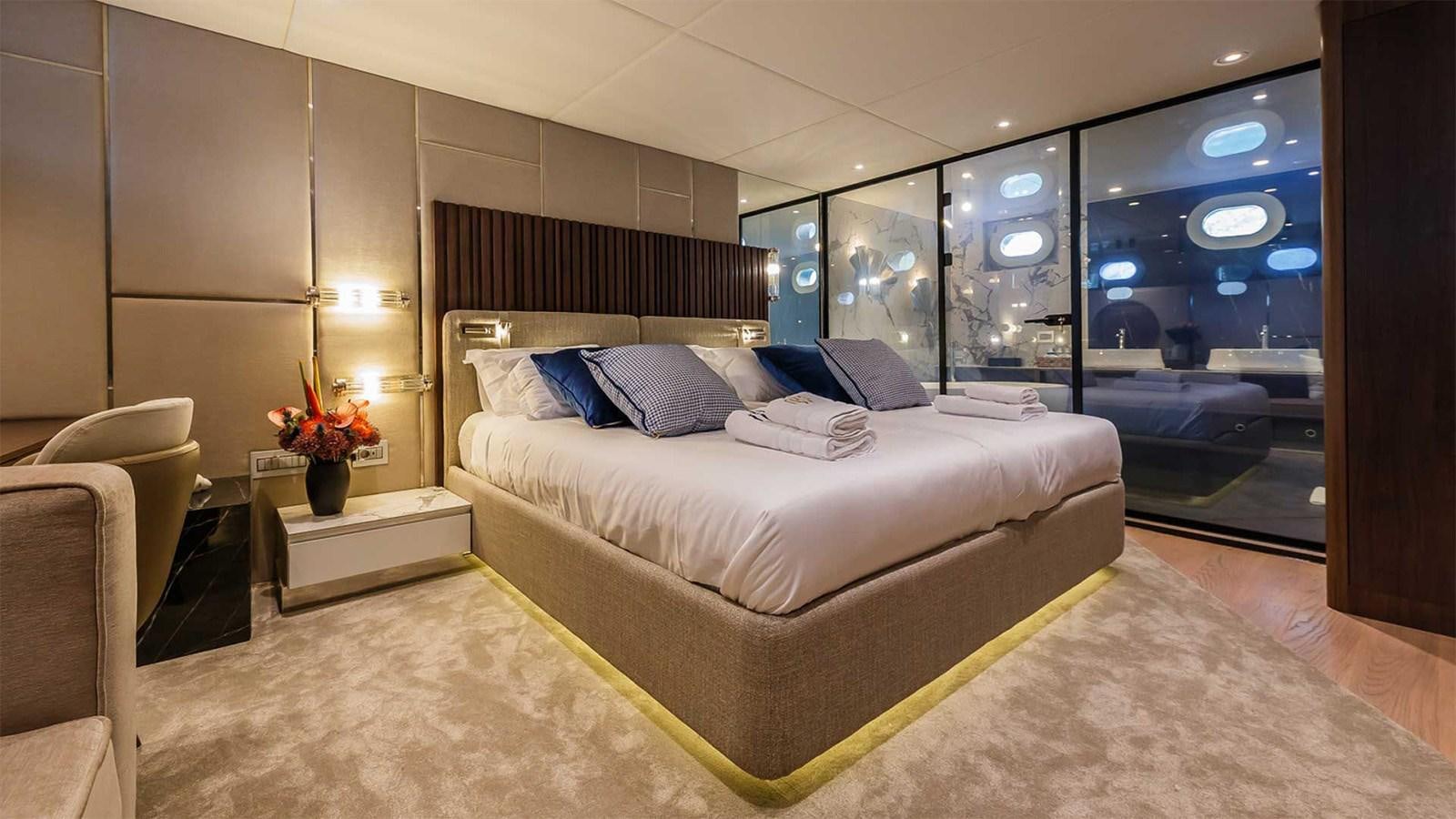 a large bed in a room aboard CLASE AZUL Yacht for Sale