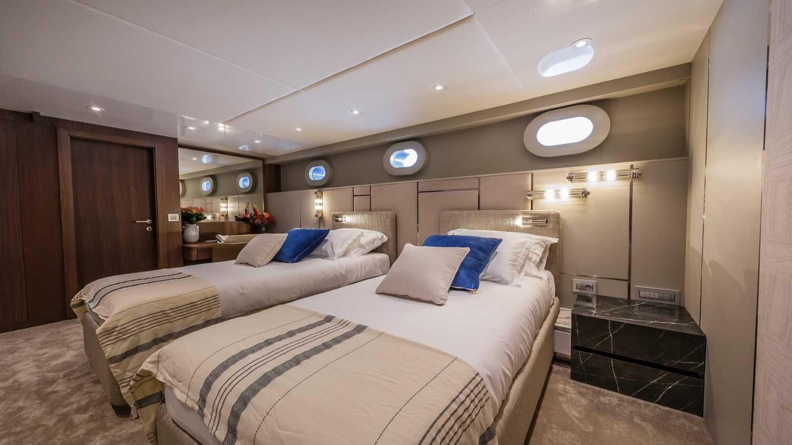 a room with two beds aboard CLASE AZUL Yacht for Sale
