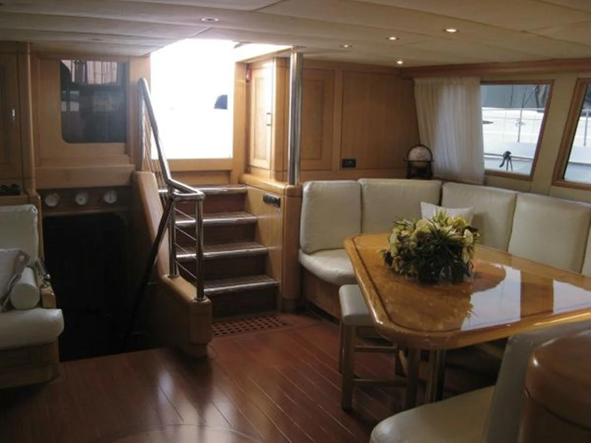 a kitchen and dining area aboard ORIEL Yacht for Sale