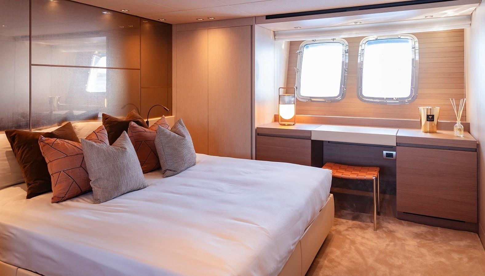 a bed in a room aboard LA SX88 Yacht for Sale