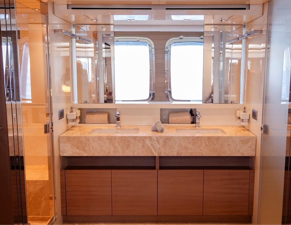 a bathroom with a countertop sink aboard LA SX88 Yacht for Sale