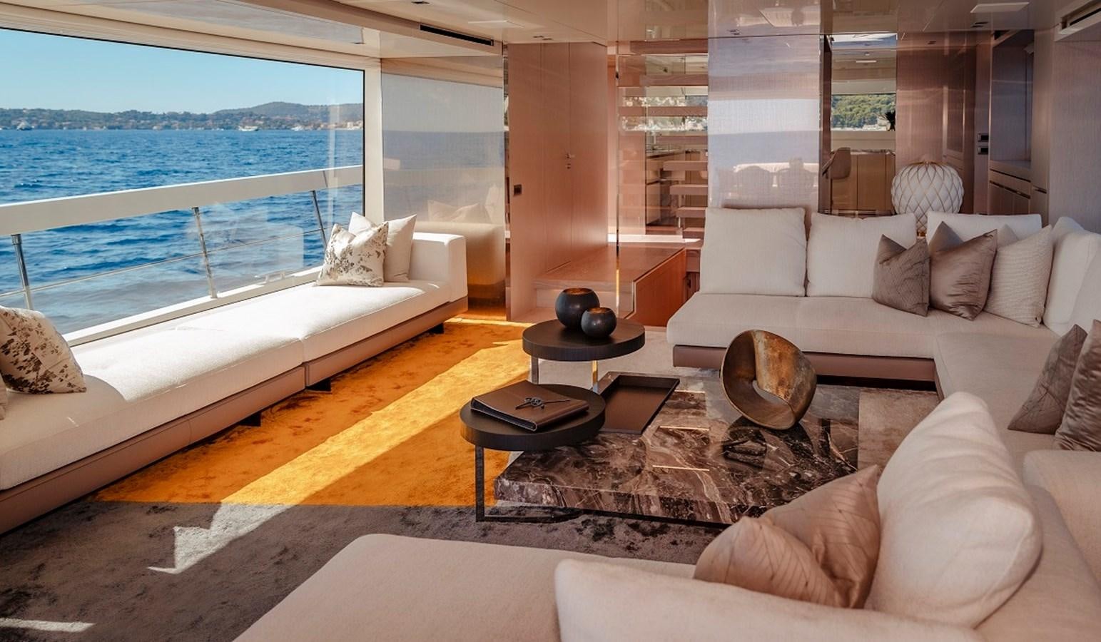 a living room with a large window aboard LA SX88 Yacht for Sale
