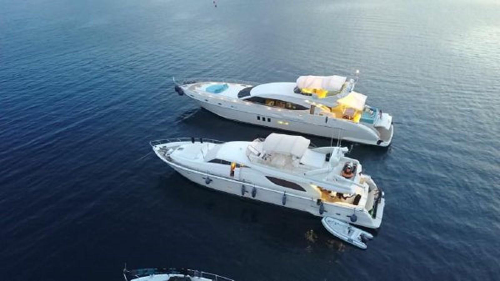 a boat in the water aboard 2000 FERRETTI  80 Yacht for Sale