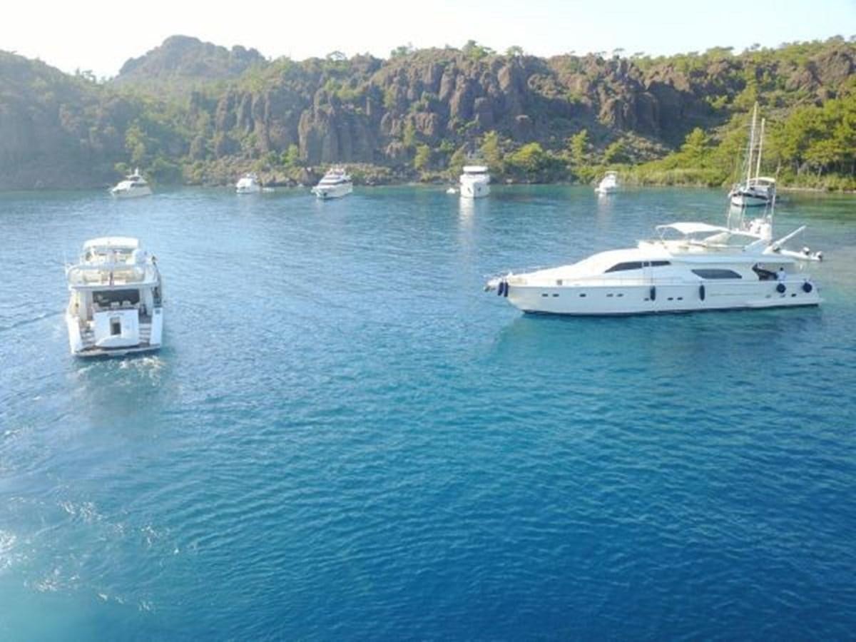 a group of boats in the water aboard 2000 FERRETTI  80 Yacht for Sale