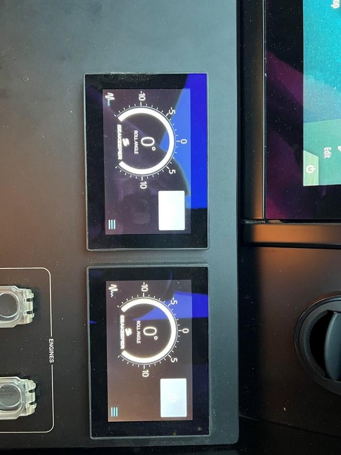 a rectangular electronic device aboard AISULU Yacht for Sale