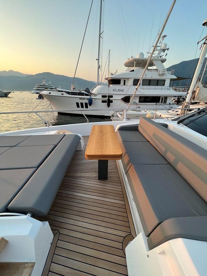 a boat docked at a pier aboard AISULU Yacht for Sale