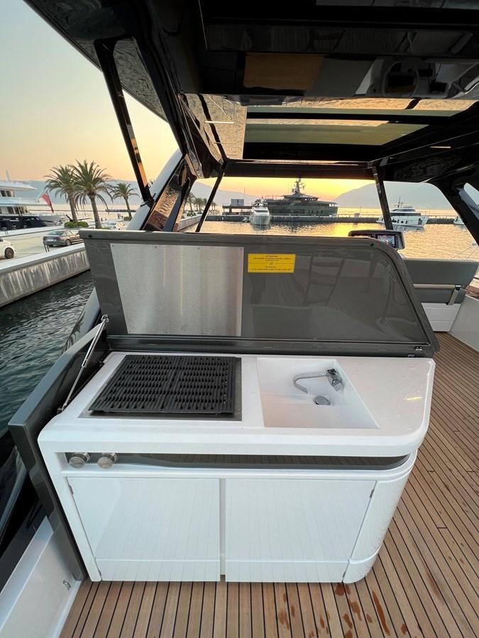 a large white machine aboard AISULU Yacht for Sale
