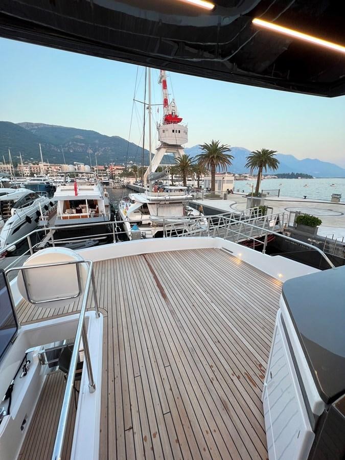 a boat docked at a pier aboard AISULU Yacht for Sale