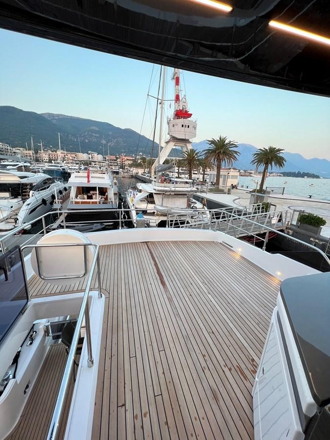 a boat docked at a pier aboard AISULU Yacht for Sale