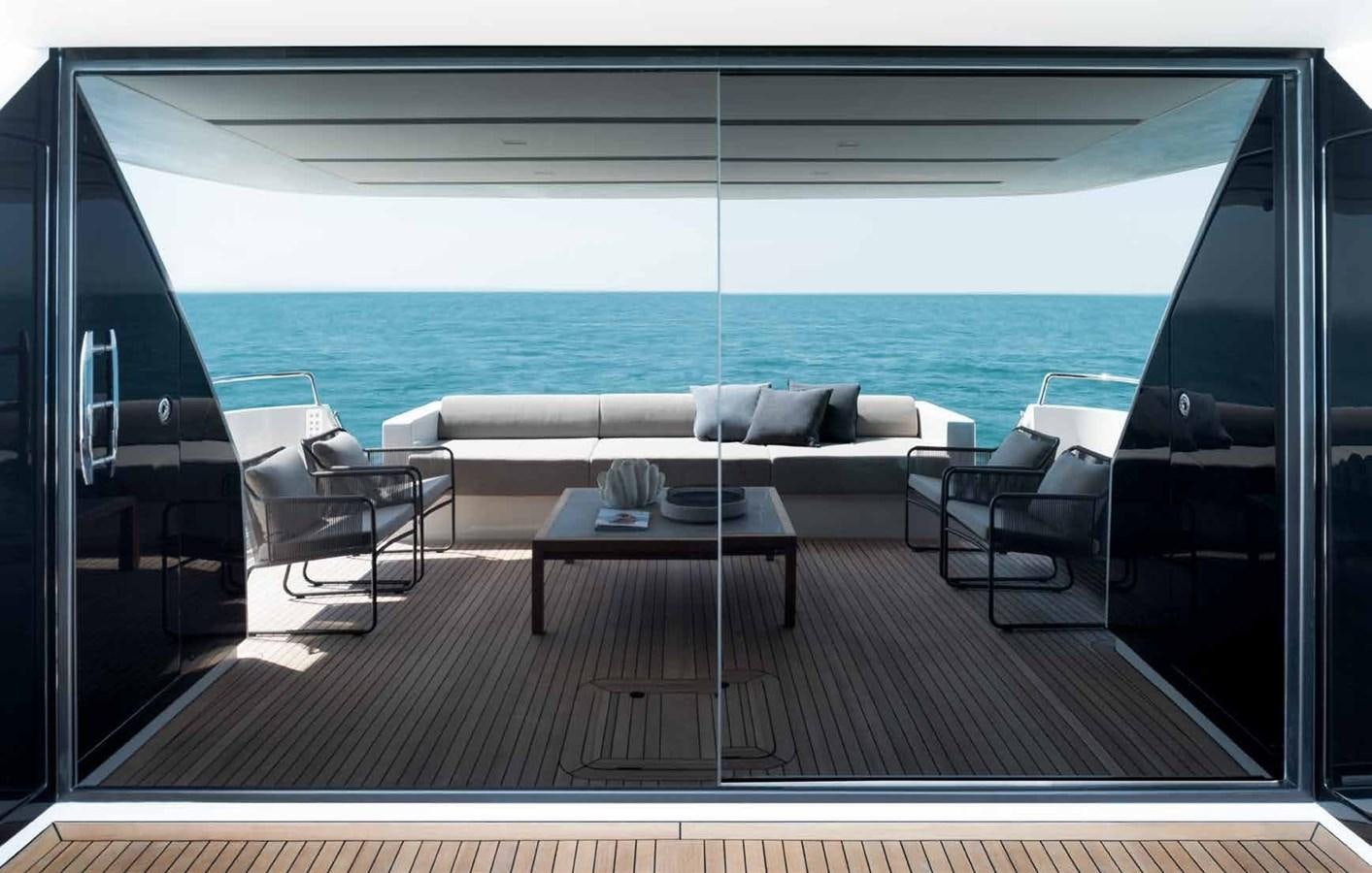 a room with a table and chairs aboard 2017 SANLORENZO SL86 # 676 Yacht for Sale