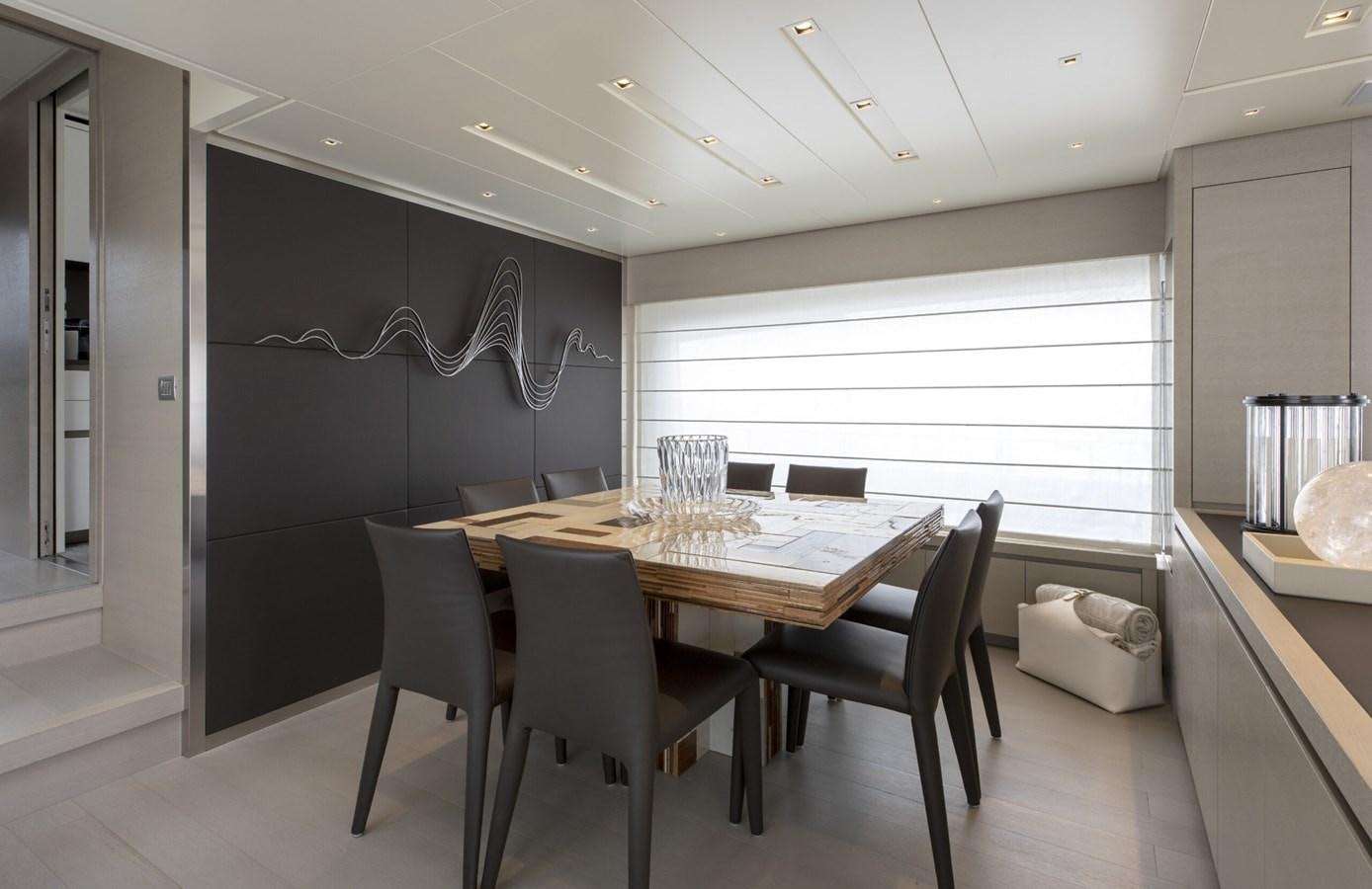 a dining table in a room aboard 2017 SANLORENZO SL86 # 676 Yacht for Sale